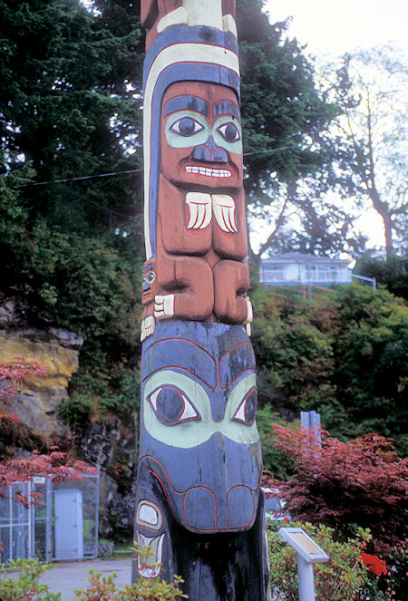 Chief's Totem Pole at Skedans with (bottom to top) a Killer Whale, Rainbow Person, Tcamaos (legendary creature that could roll-over canoes), Eagle and 3 Watchmen in Prince Rupert, British Columbia