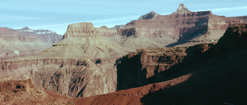 Zoroaster Temple (right) from trail within inner gorge, Sumner Butte across Colorado Granite Gorge, Bright Angel Canyon on left - Grand Canyon National Park - Dec 1961