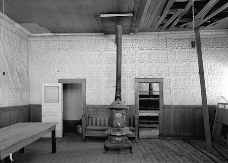 Interior, showing stove and metal wall covering - U. S. Land Office Building