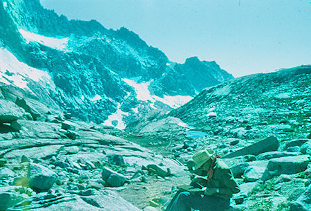 Looking back down Kaweah Gap toward Hamilton Lake, unknown fellow hiker - Sequoia National Park 20 Jul 1957