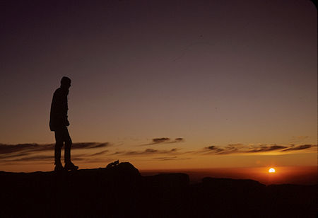 Explorer Post 360 member admiring sunrise on top of Mount Whtiney - 21 Aug 1965