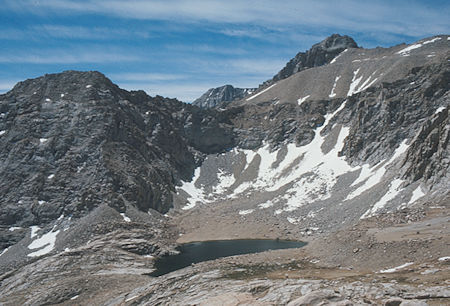 Meysan Lake, Mt. LeConte (skyline right), Mount Corcoran (behind Mt. LeConte) from Candlelight Peak ridge - Jul 1975