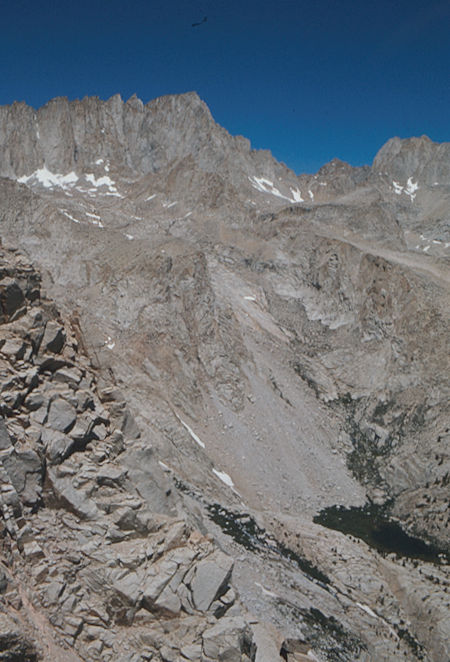 Keeler Needle and Mount Whitney (left), Mt. Russell (right), Wotans Throne (left foreground), Mirror Lake (lower right) from Candlelight Peak - Jul 1975