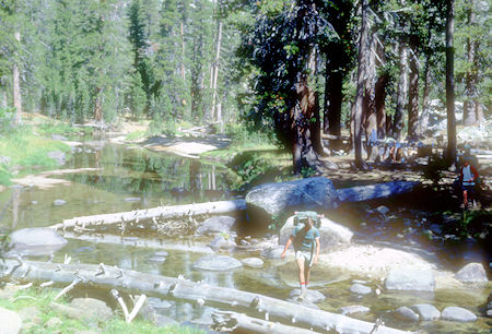 Bob Johnson crossing North Fork Cherry Creek above Cow Meadow.  Boy Scout group was camped nearby - Emigrant Wilderness - Aug 1966