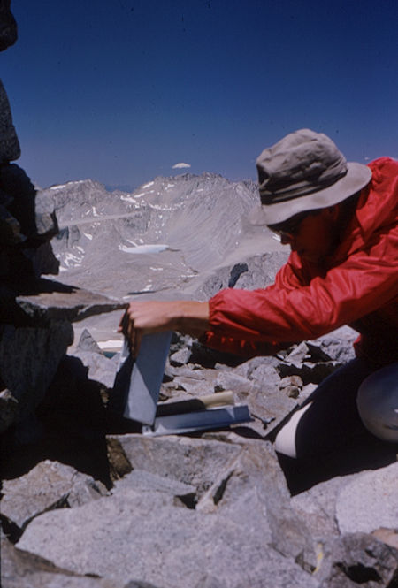 Checking out the register on top of Mt. Williamson - Jul 1964