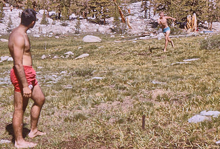 Playing 'horseshoes' with a stick at Whitney Creek - 20 Aug 1965