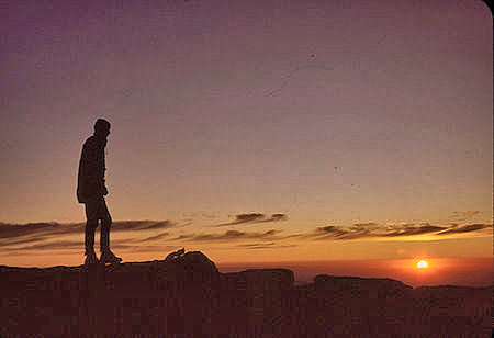 Explorer Post 360 member admiring sunrise on top of Mount Whtiney - 21 Aug 1965