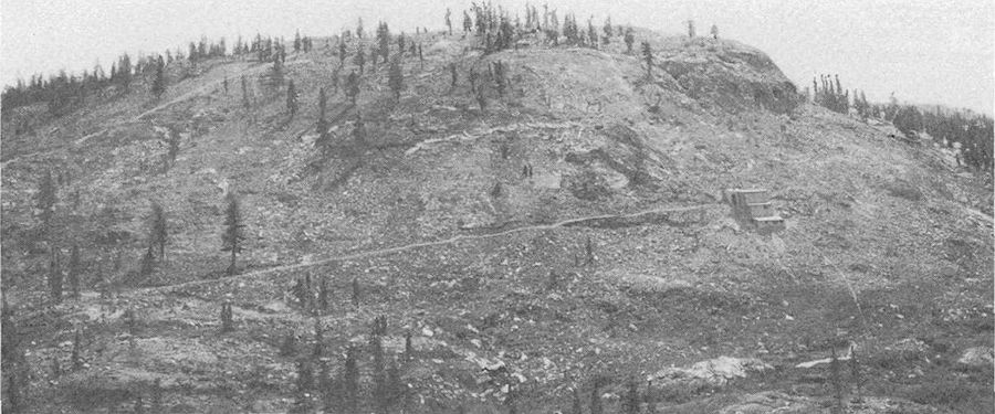 FIGURE 13. Western part of the Whittle property. Gravity concentrating mill is to the right in the photograph