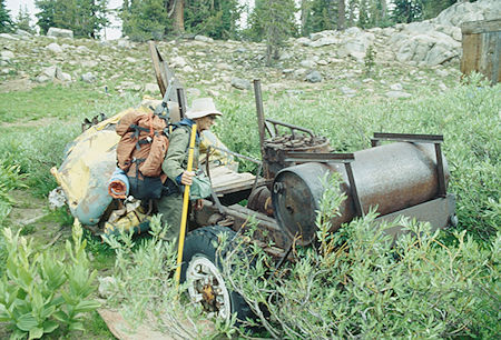 Gil Beilke examining old mine vehicle at Snow Lake - Emigrant Wilderness - Aug 1993