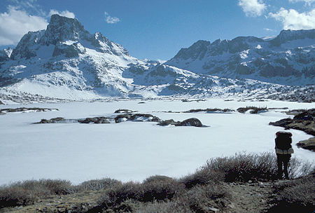 Frozen Thousand Island Lake and Banner Peak.  You can see the sloping route on the right leading to the Lake Catherine pass - Ansel Adams Wilderness - Jul 1977