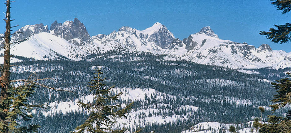 Minarets, Mt. Ritter, Banner Peak from valley rim - Devil's Postpile area 18 Feb 1973