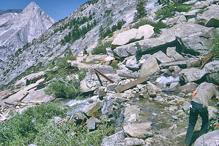 Bridge wiped out by avalanche on Dusy Branch Creek climbing out of LeConte Canyon - Kings Canyon National Park 22 Aug 1969