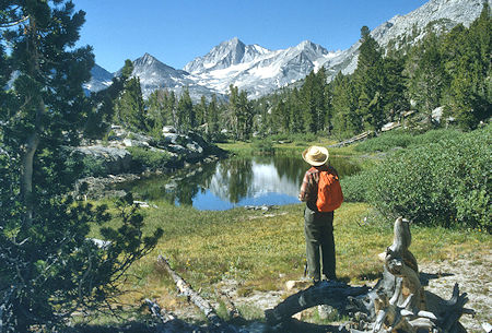 Don Stansifer admiring Bear Creek Spire over 'Dons Pond' on Mono Pass Trail - 1987