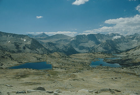 Mono Pass, Mt. Abbot, Mt. Mills, Mt. Gabb, Fourth Recess, Third Recess, Pioneer Basin from Steelhead Lake saddle - 1987