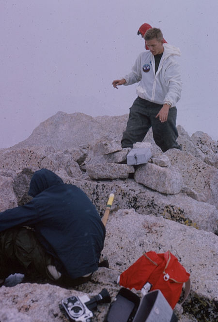 Helmut Siekmann and peak register on top of cloudy  Mt. Barnard - May 1965