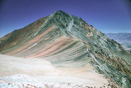 Mt Tom from the saddle above Hanging Valley on the way to Peak 12224. The road coming up from Horton Lake can be seen near the lower right. The Tungstar Mine can be seen above the end of the road left of center. The Hanging Valley Mine can just barely be seen toward the middle left - 10 Jul 1977