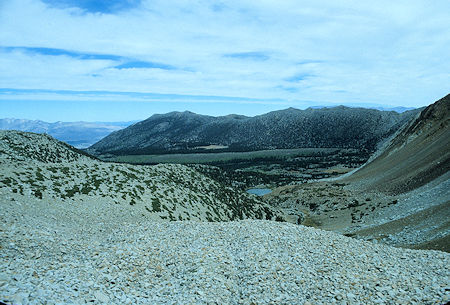 Francis Lake and the Wheeler Crest from Mount Morgan route. The route proceeds from Francis Lake up its inlet stream and then climbs the slope on the left