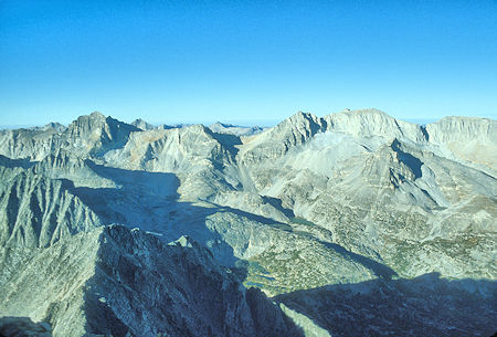 From top of Mount Morgan with early morning shadows, Bear Creek Sphire, Peak 13268, Mt Dade, Mt Abbot and Mt Mills on the skyline. Treasure Peak in front of Mt Abbot with Treasure Lakes below left