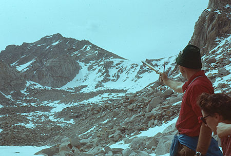 Jim Moore pointing way to University Peak - Kings Canyon National Park 1960