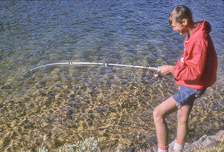 Bob Johnson catching a fish at Summit Lake - Hoover Wilderness - 05 Sep 1964
