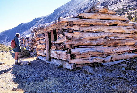 Kevin Twohey checks out mine cabins circa 1890's at Mono Pass
