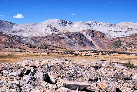 Looking generally west at the Kuna Crest skyline. Spillway Lake is barely visible on the right. The basin containing Helen Lake is on the left. Parker Pass is at or just beyond the left edge of the picture