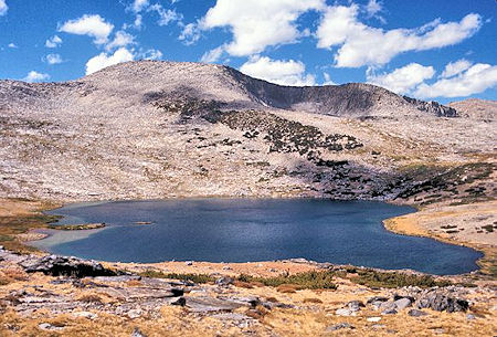 Helen Lake with the Kuna Crest on the skyline. There is a lake in the basin just right of center. It's a relatively easy hike up the slopes on the left to the top of the Kuna Crest