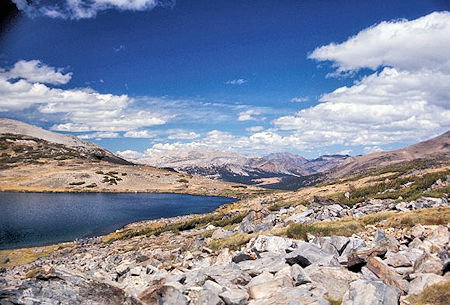View from Helen Lake down the Dana Fork shows the Dana Meadows. Tioga Pass is just beyond the right end of the meadows