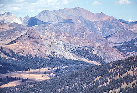 In this telephoto picture from Helen Lake you can see the Tioga Pass road along the far side of Dana Meadows. The pass and entrance station are just beyond the end of the meadow .. diagonally down from the grassy saddle on the left edge of the picture