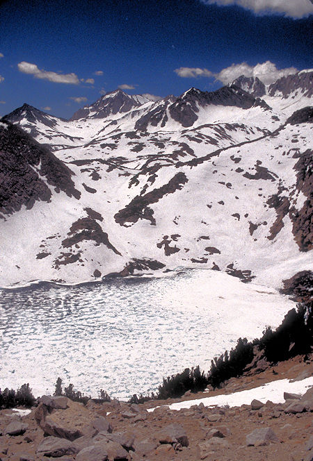 Bear Creek Spire over frozen Ruby Lake from Mono Pass trail - 1995
