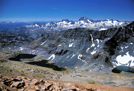 From Parker Peak you have this fine view of the Alger Lakes with Banner Peak and Mt. Ritter on the skyline just right of center. At the left side of the picture, behind the ridge, you can see Gem lake with its "bathtub ring" shoreline
