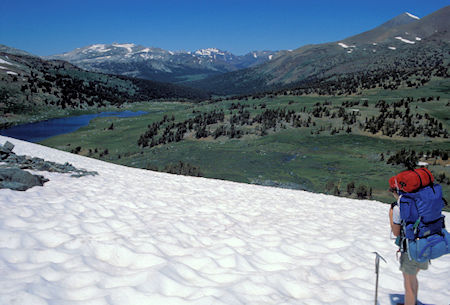 Jimmy White admiring the view over Spillway Lake as we start up the snow field below Helen Lake toward the Kuna Crest