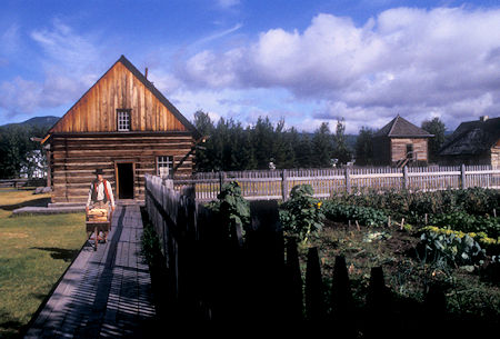 Trade Store (1884), garden and Fish Cache (1889) in rear, Fort St. James National Historic Site, British Columbia