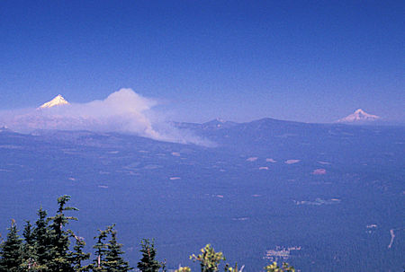 Mt. Jefferson (forest fire smoke) and Mt. Hood (right) from Black Butte Lookout near Sisters, Oregon