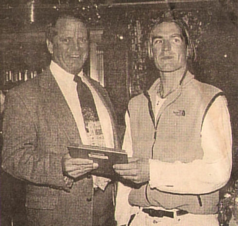 Sheriff Dan Paranick (left) giving the 1999 Candidate Member of the Year award to Jim Bridger