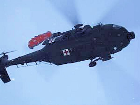 Avalanche victim Johanna Carlsson being raised into a National Guard Blackhawk helicopter for transport to Fresno