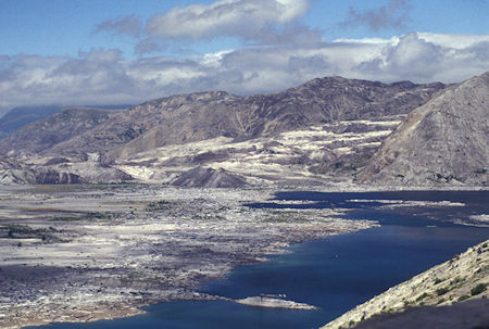 Spirit Lake and chunks of mountain that created new dam enlarging the lake, as seen from Windy Ridge, Mount St. Helens National Volcanic Monument, Washington