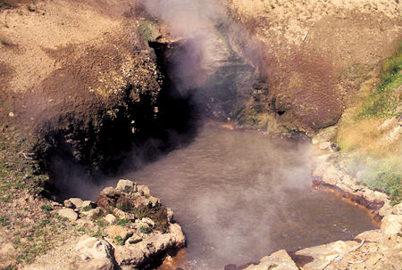Dragons Mouth Spring (it belches), Mud Volcano area, Yellowstone National Park